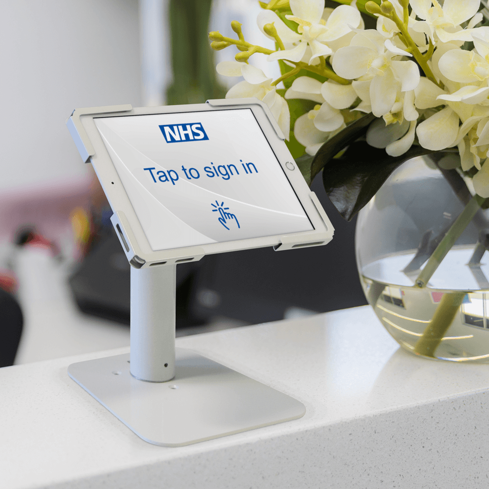 White tablet holder on a reception desk